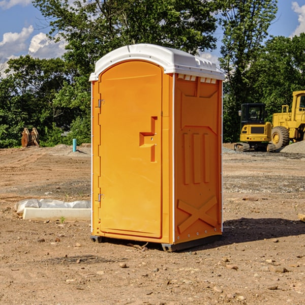 what is the cost difference between standard and deluxe portable restroom rentals in Sayre AL